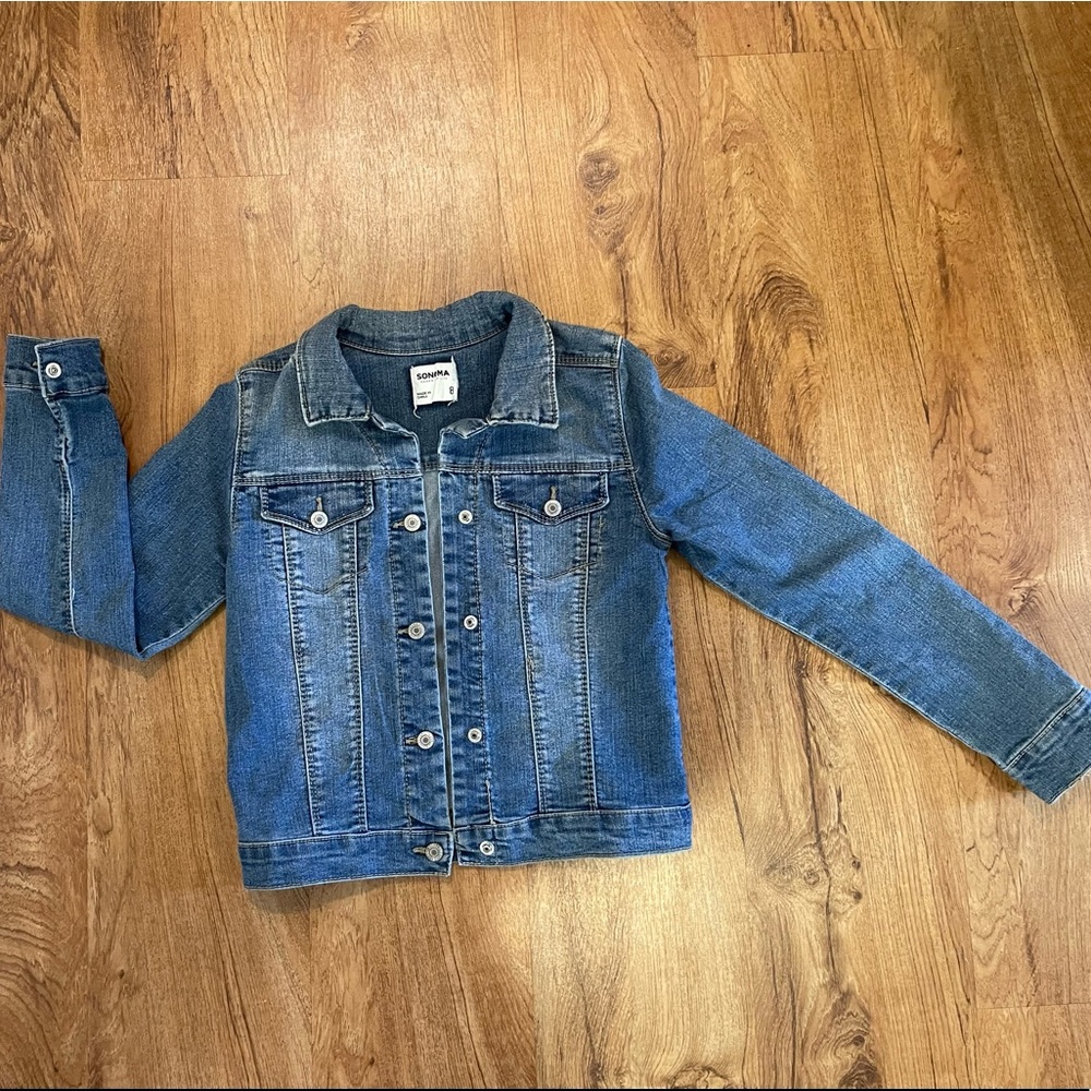 Adorable jean jacket with snap buttons